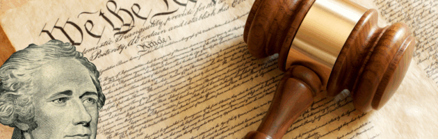 Image of the Constitution with Alexander Hamilton and a gavel in the foreground.